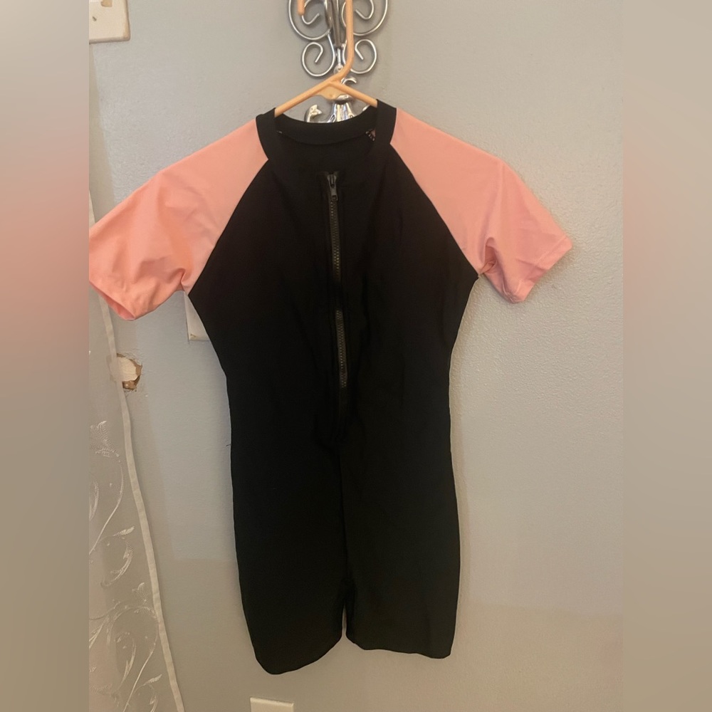 Rash guard one piece. Never worn size medium